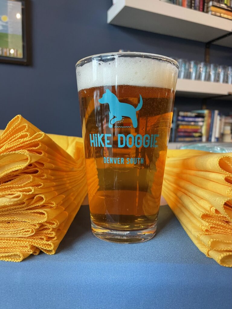 Hike Doggie branded beer glass with chips, community event