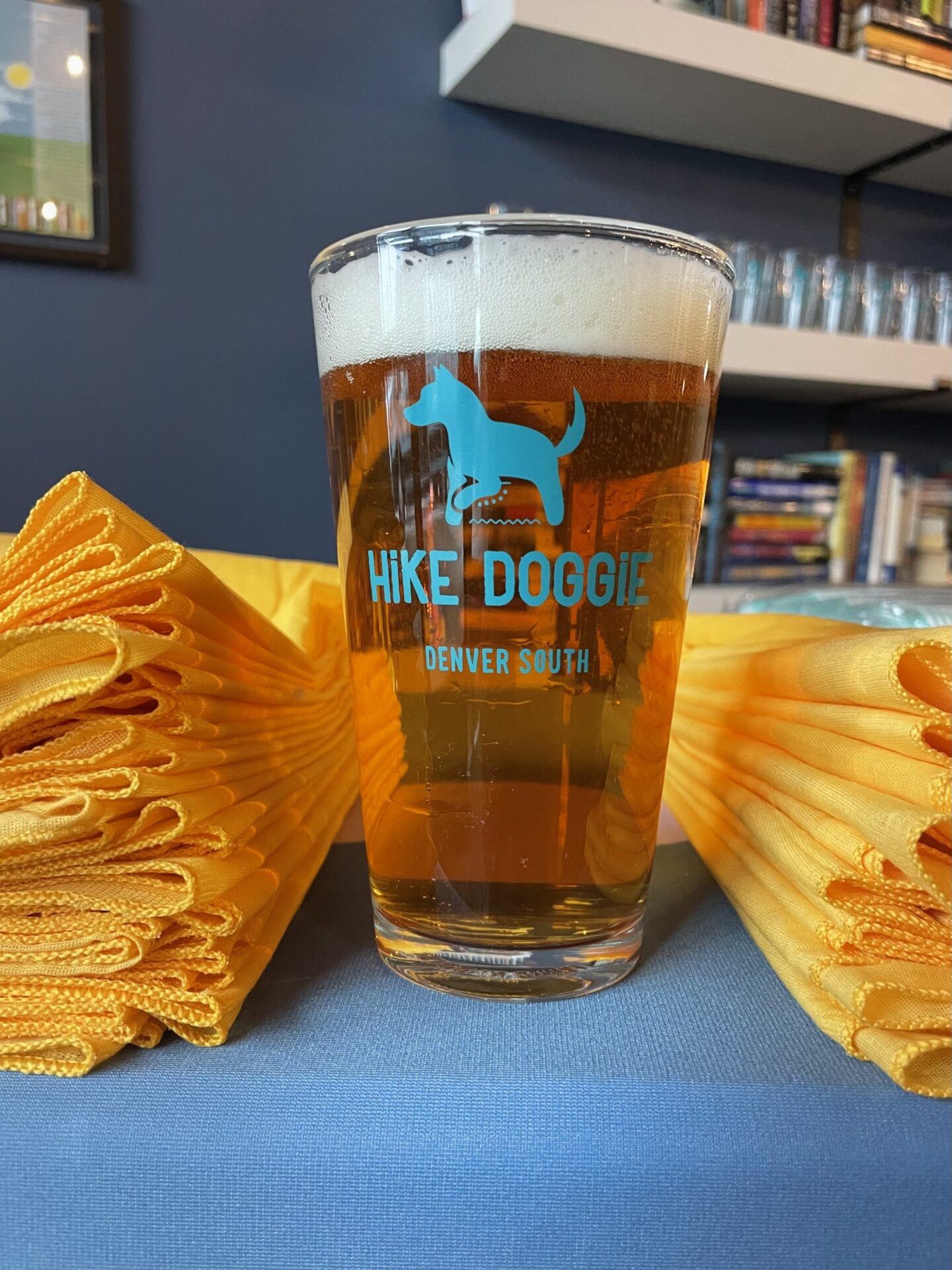 Hike Doggie branded beer glass with chips, community event